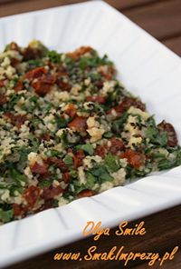 Plate of chopped herb salad with tomatoes and crumbled cheese on a white square dish; watermark reads Olga Smile www.SmakImprezy.pl